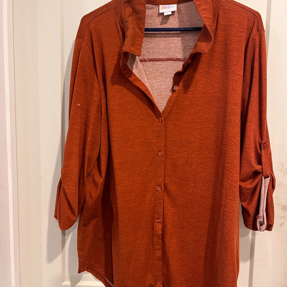 Beautiful orange button down! Lots of stretch and soft